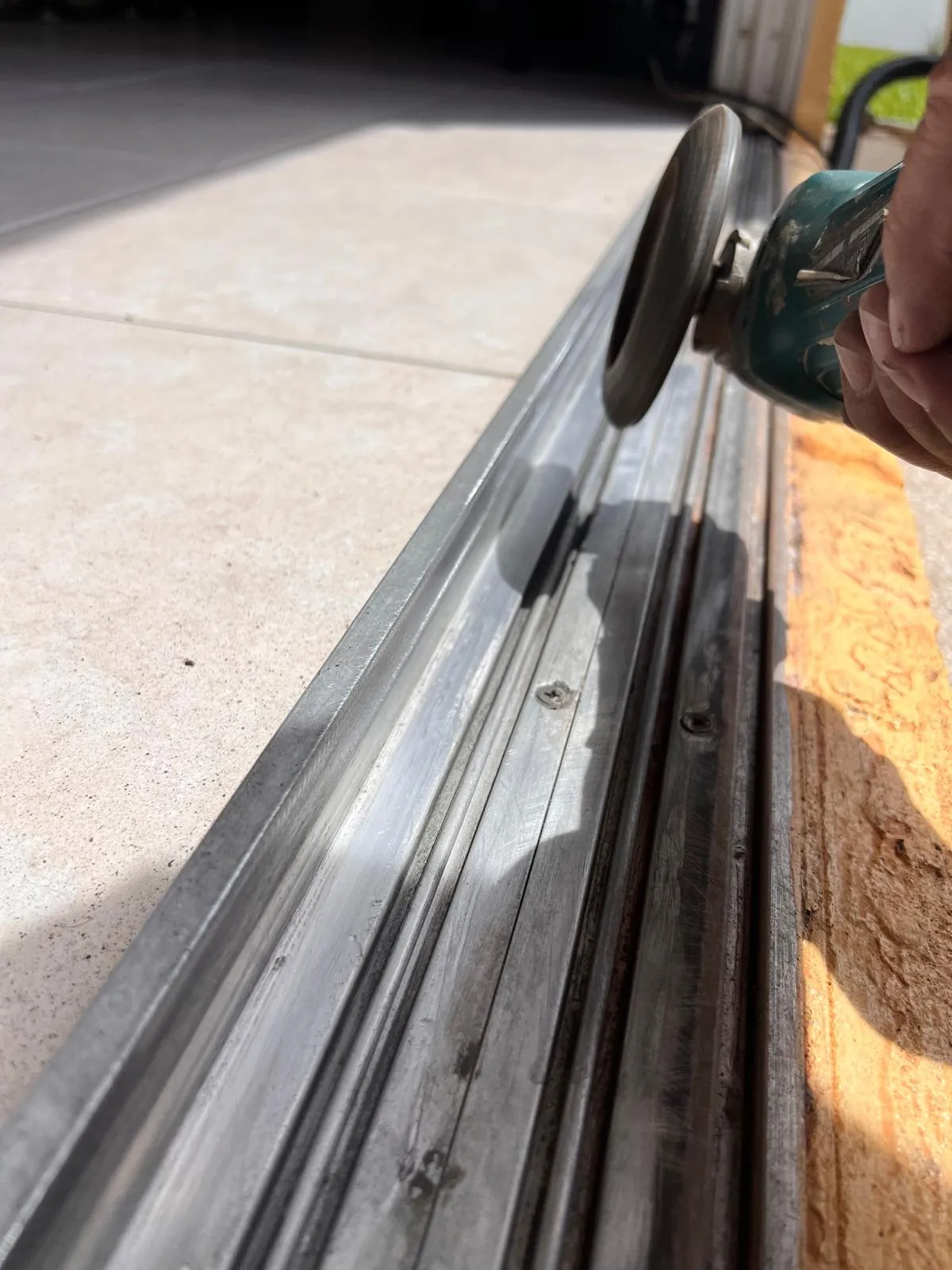 Professional track repair ensuring proper door alignment